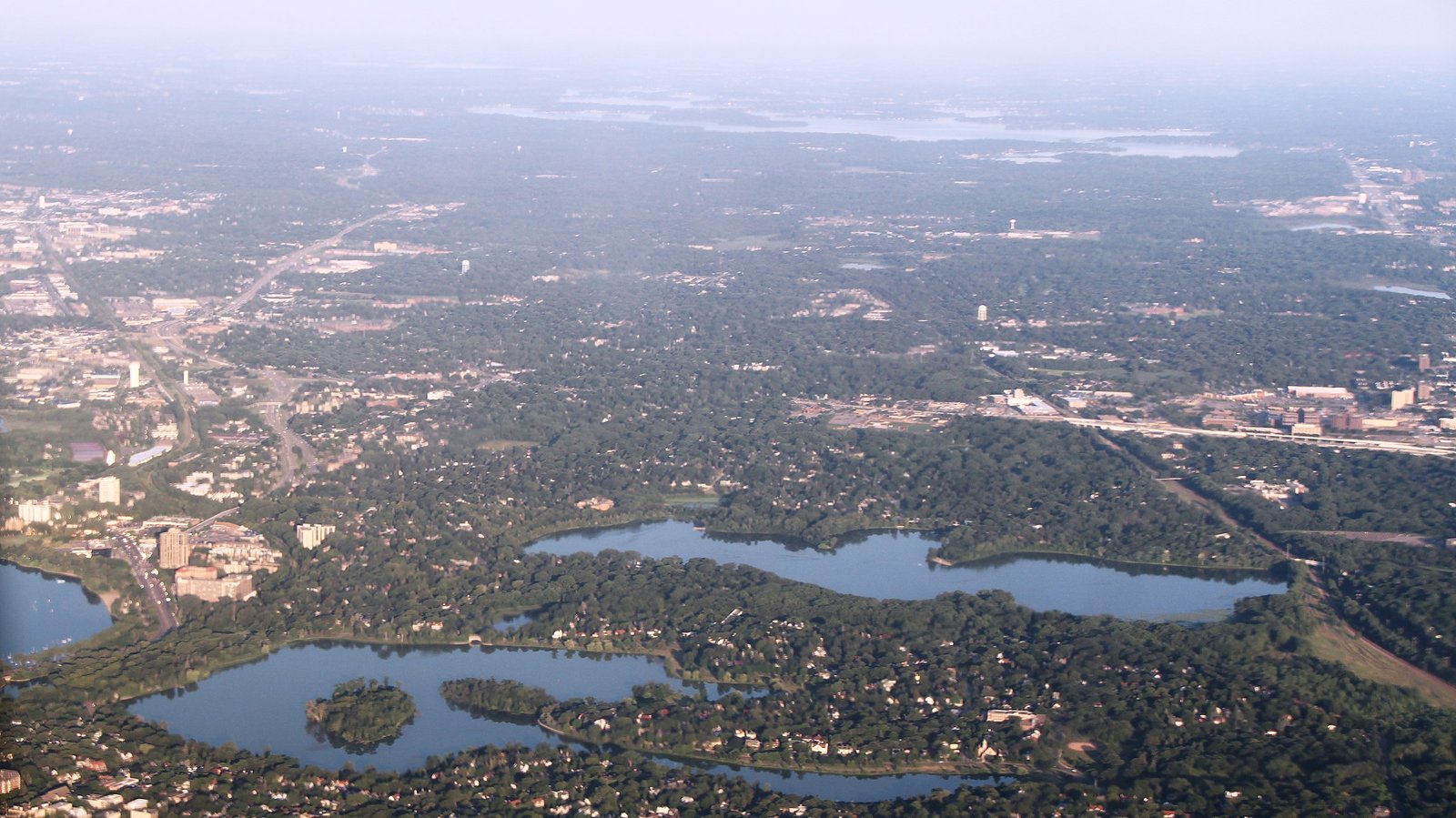 Twin Cities skyline and water representing Hennepin County urban lake access.