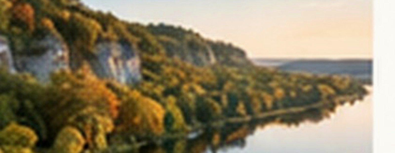 Bluff-country lake valley generated for the Regions page Southeast feature panel.
